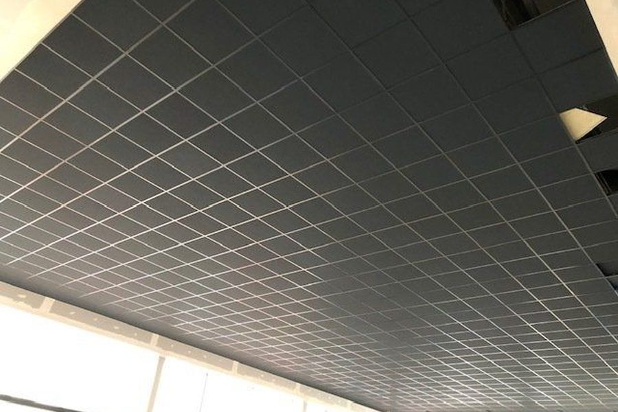 Suspended grid and tile ceiling