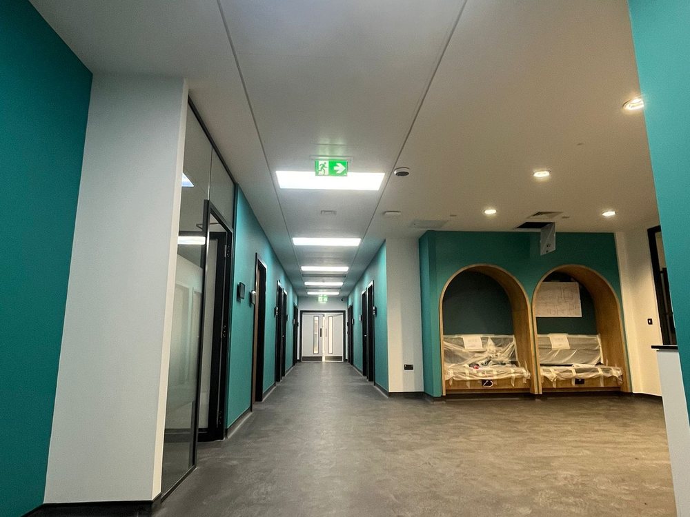 Teaching block corridor boarded and finished
